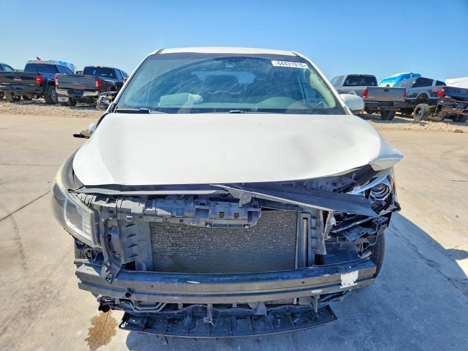Photo 5 from auction – 2015 KIA SEDONA with VIN KNDMA5C10F6029424