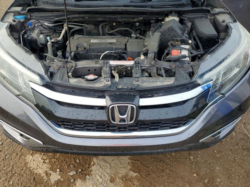 Photo 12 from auction – 2015 HONDA CR-V with VIN 5J6RM4H74FL083888