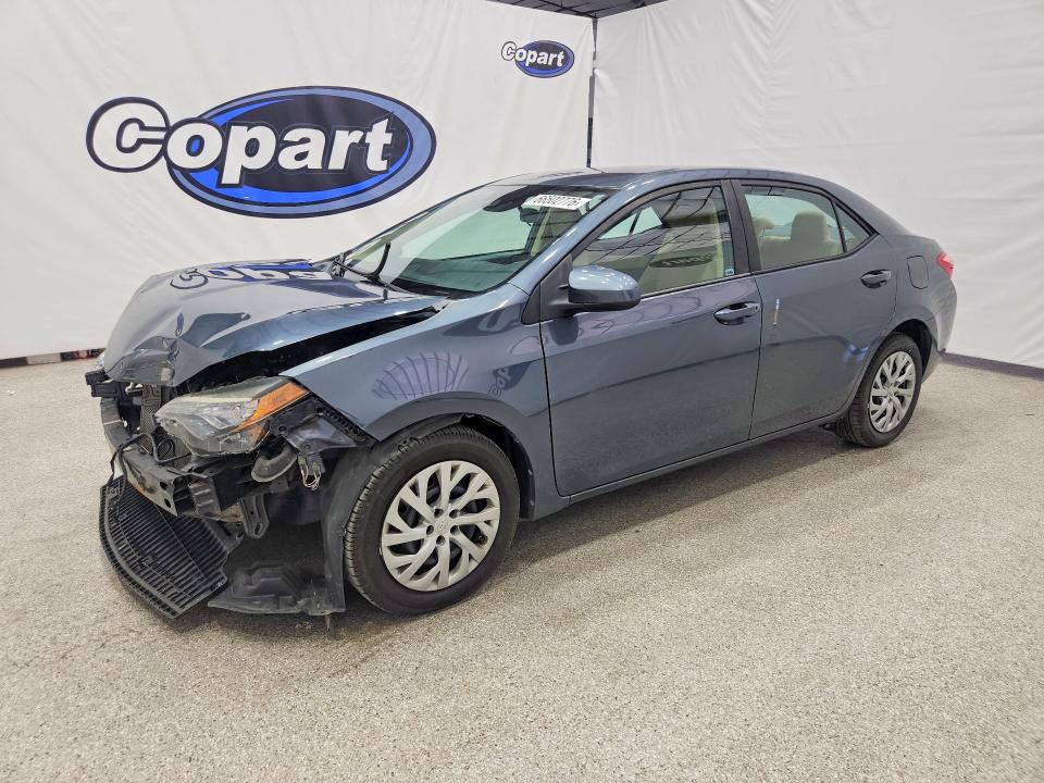 TOYOTA COROLLA 2017 с VIN 5YFBURHE2HP614177 - Фото с аукциона