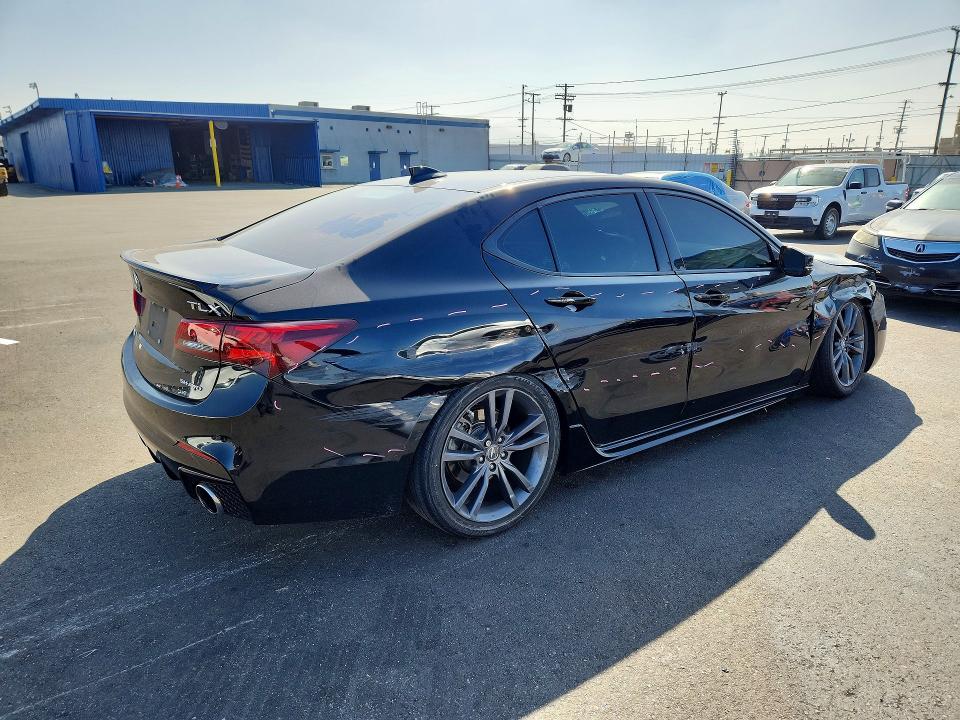 Photo 3 from auction – 2018 ACURA TLX with VIN 19UUB3F69JA000617