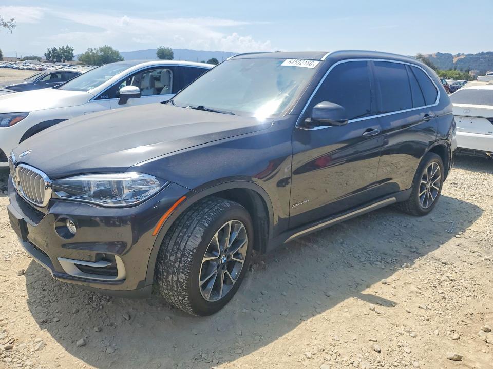 BMW X5 2018 with VIN 5UXKR0C50J0X87571 - Photo from auction
