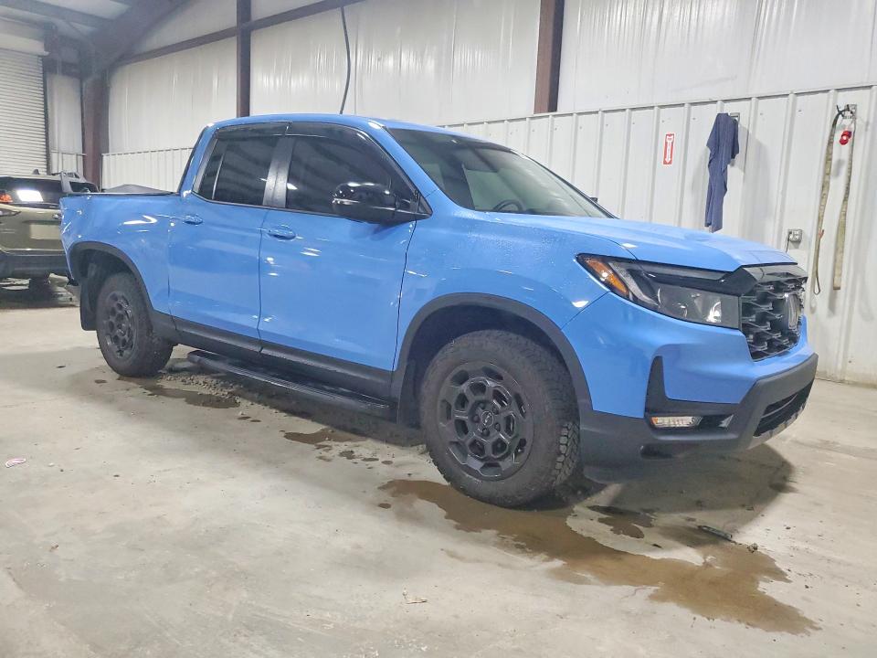 Photo 4 from auction – 2025 HONDA RIDGELINE with VIN 5FPYK3F75SB045885