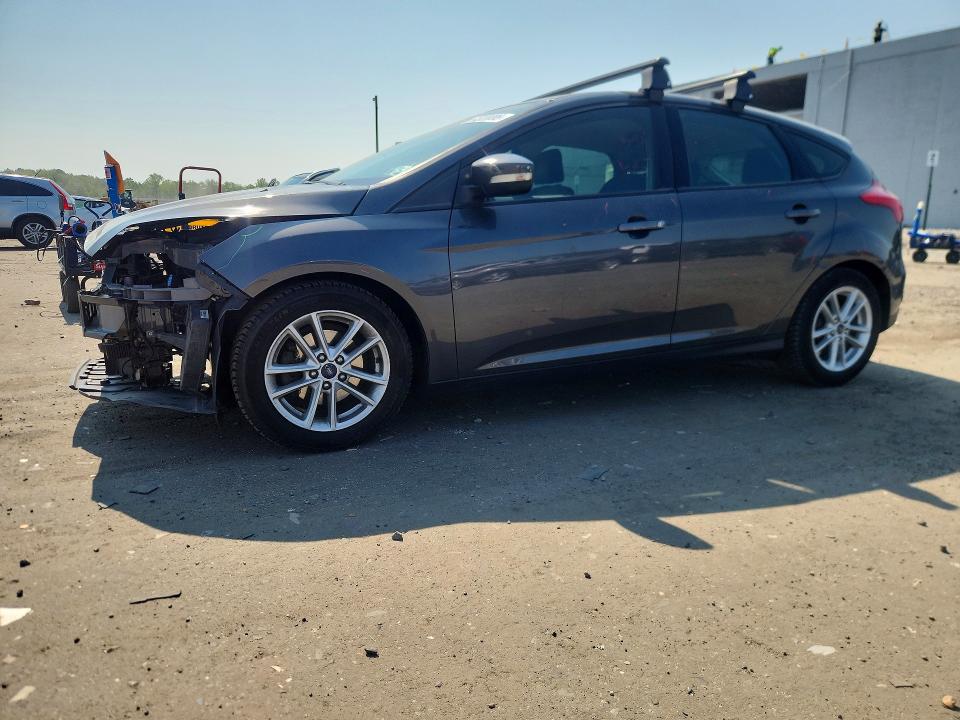 FORD FOCUS 2017 with VIN 1FADP3K20HL346403 - Photo from auction
