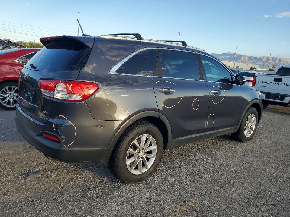 Photo 3 from auction – 2016 KIA SORENTO with VIN 5XYPG4A34GG166598