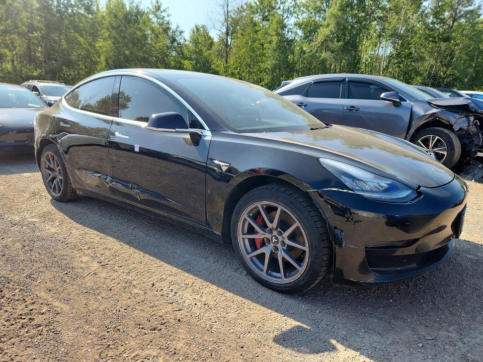 Photo 4 from auction – 2020 TESLA MODEL 3 with VIN 5YJ3E1EA8LF734042