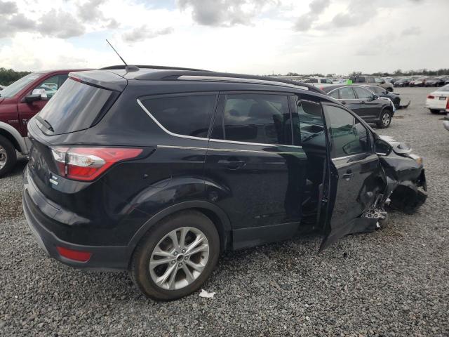 Photo 3 from auction – 2018 FORD ESCAPE with VIN 1FMCU0GD5JUA79617