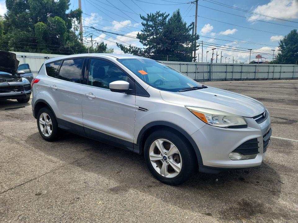 Photo 4 from auction – 2013 FORD ESCAPE with VIN 1FMCU9G94DUA21227