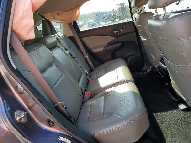 Photo 11 from auction – 2015 HONDA CR-V with VIN 2HKRM3H55FH545314