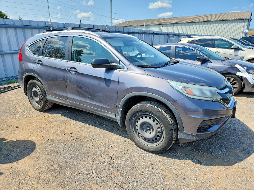 Photo 4 from auction – 2016 HONDA CR-V with VIN 2HKRM4H34GH130801
