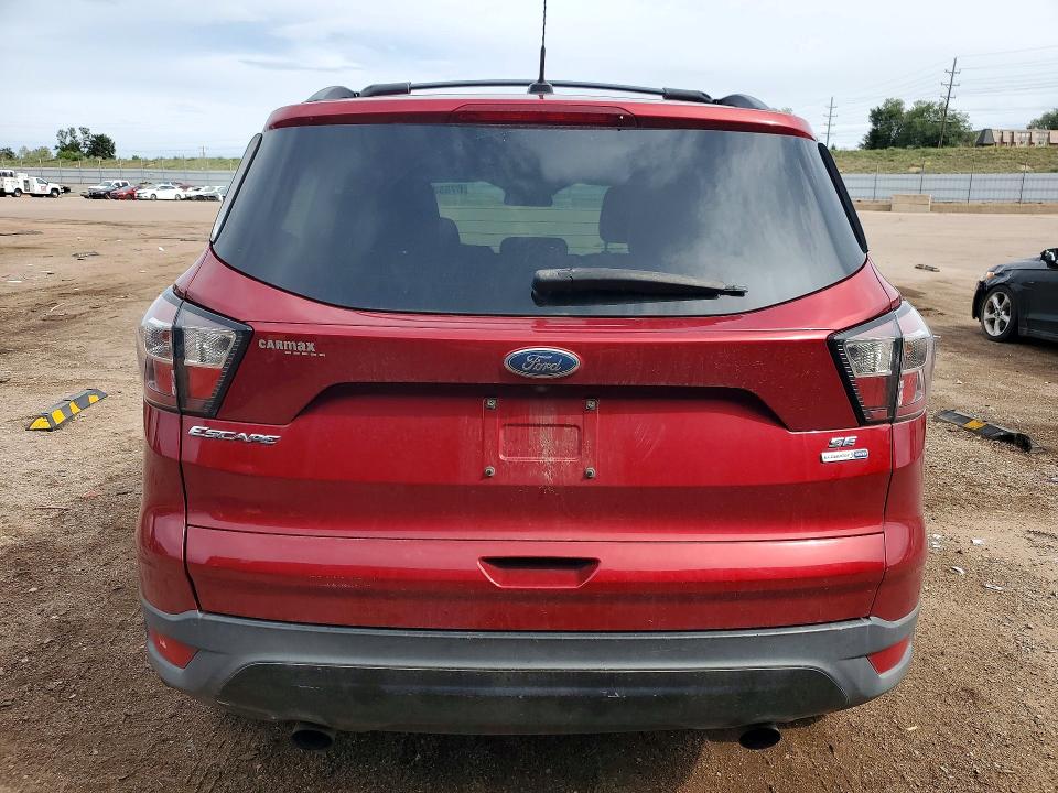 Photo 6 from auction – 2018 FORD ESCAPE with VIN 1FMCU9GD7JUA62273
