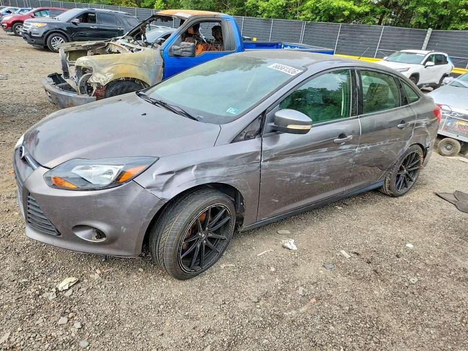 FORD FOCUS 2014 with VIN 1FADP3F26EL292126 - Photo from auction