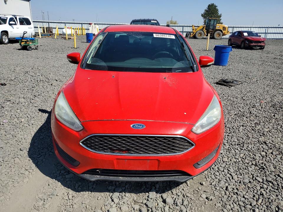Photo 5 from auction – 2016 FORD FOCUS with VIN 1FADP3F20GL272683