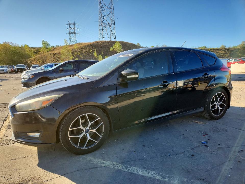 FORD FOCUS 2017 with VIN 1FADP3M23HL219657 - Photo from auction
