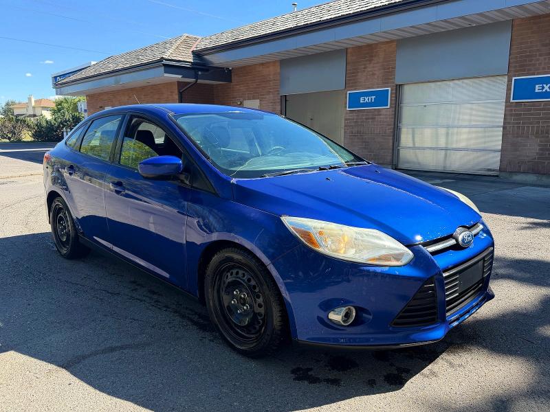 FORD FOCUS 2012 with VIN 1FAHP3F27CL202271 - Photo from auction