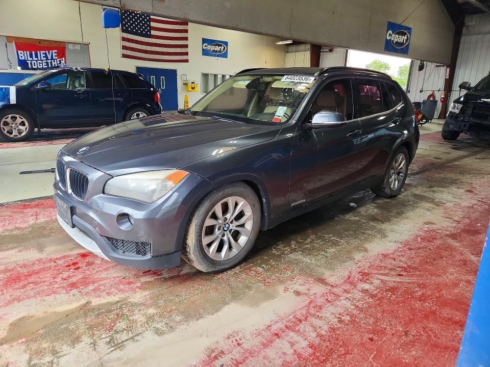 BMW X1 2013 with VIN WBAVL1C54DVR83099 - Photo from auction