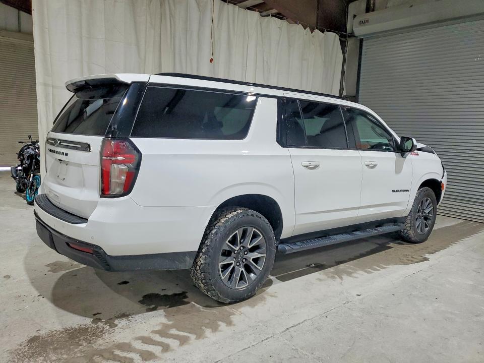 Photo 3 from auction – 2023 CHEVROLET SUBURBAN with VIN 1GNSKDKD5PR112106