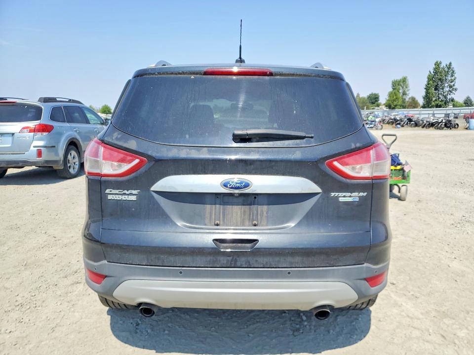 Photo 6 from auction – 2014 FORD ESCAPE with VIN 1FMCU9JX1EUD31375