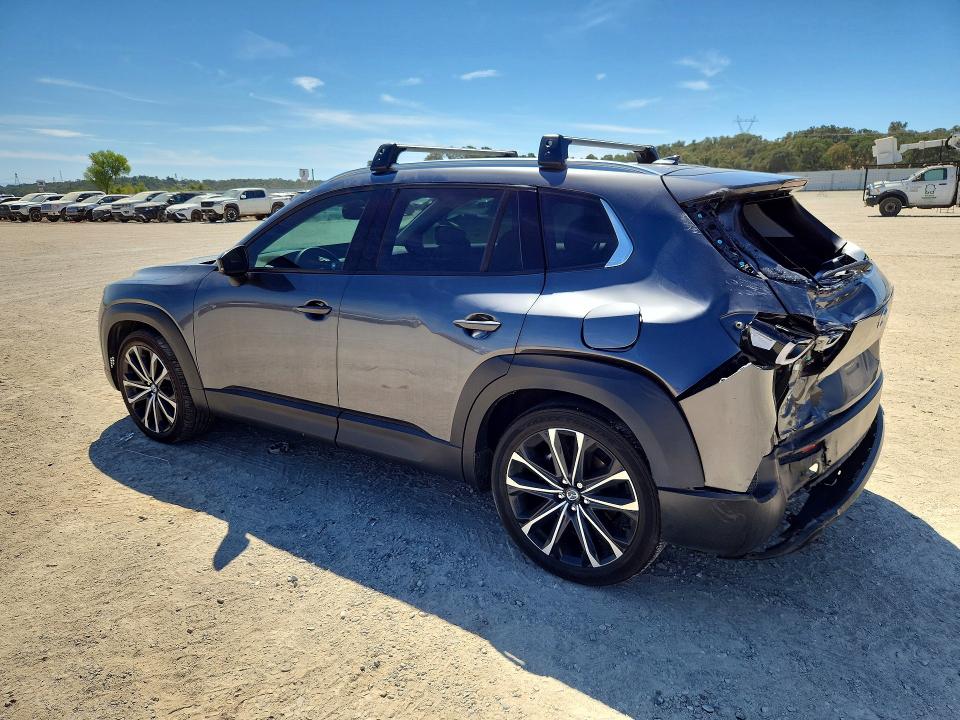 Photo 2 from auction – 2023 MAZDA CX-50 with VIN 7MMVABEM0PN104494