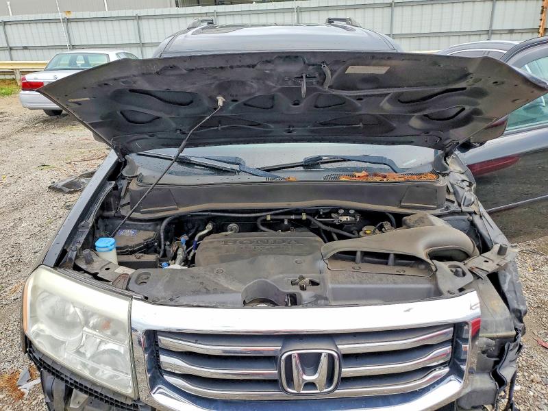 Photo 12 from auction – 2014 HONDA PILOT with VIN 5FNYF4H4XEB011841