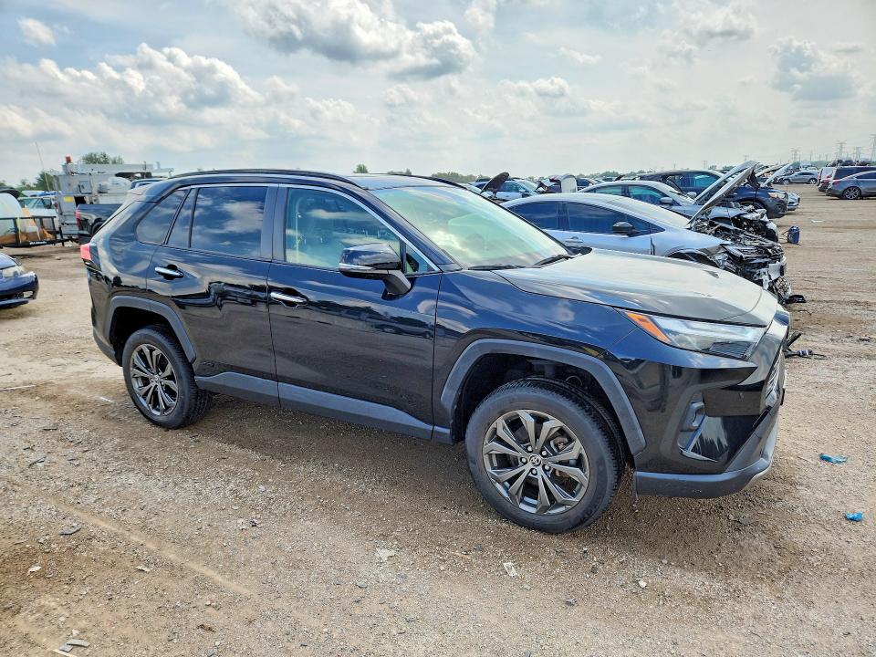 Photo 4 from auction – 2022 TOYOTA RAV4 with VIN JTMD6RFV0ND059296