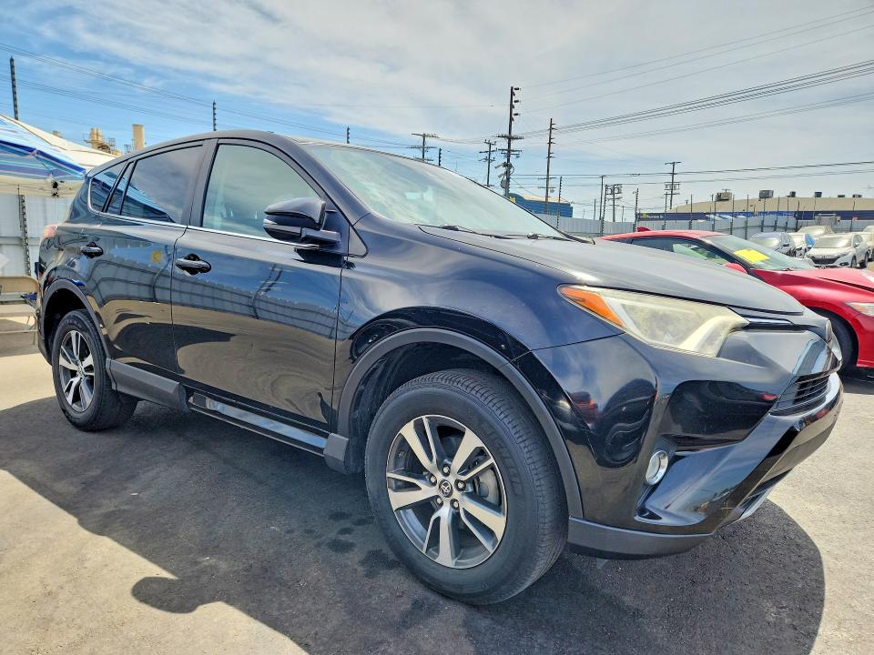 Photo 4 from auction – 2018 TOYOTA RAV4 with VIN 2T3WFREV1JW436760