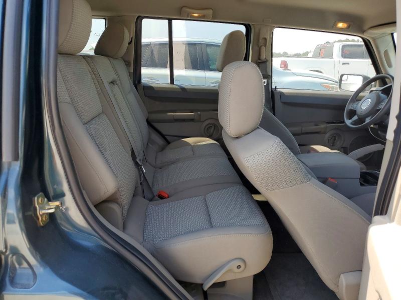 Photo 11 from auction – 2006 JEEP COMMANDER with VIN 1J8HH48N16C150458