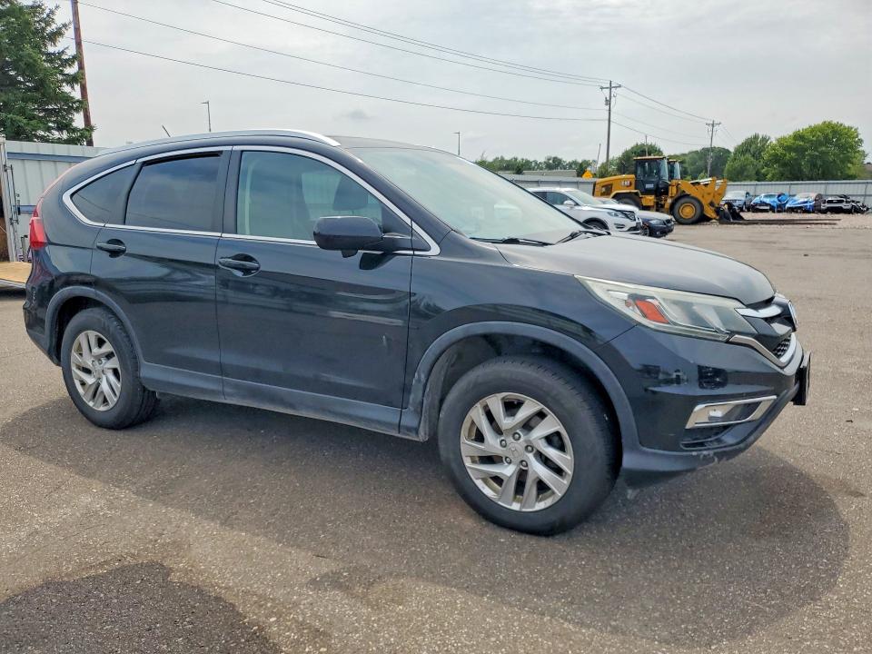 Photo 4 from auction – 2015 HONDA CR-V with VIN 5J6RM4H75FL078182