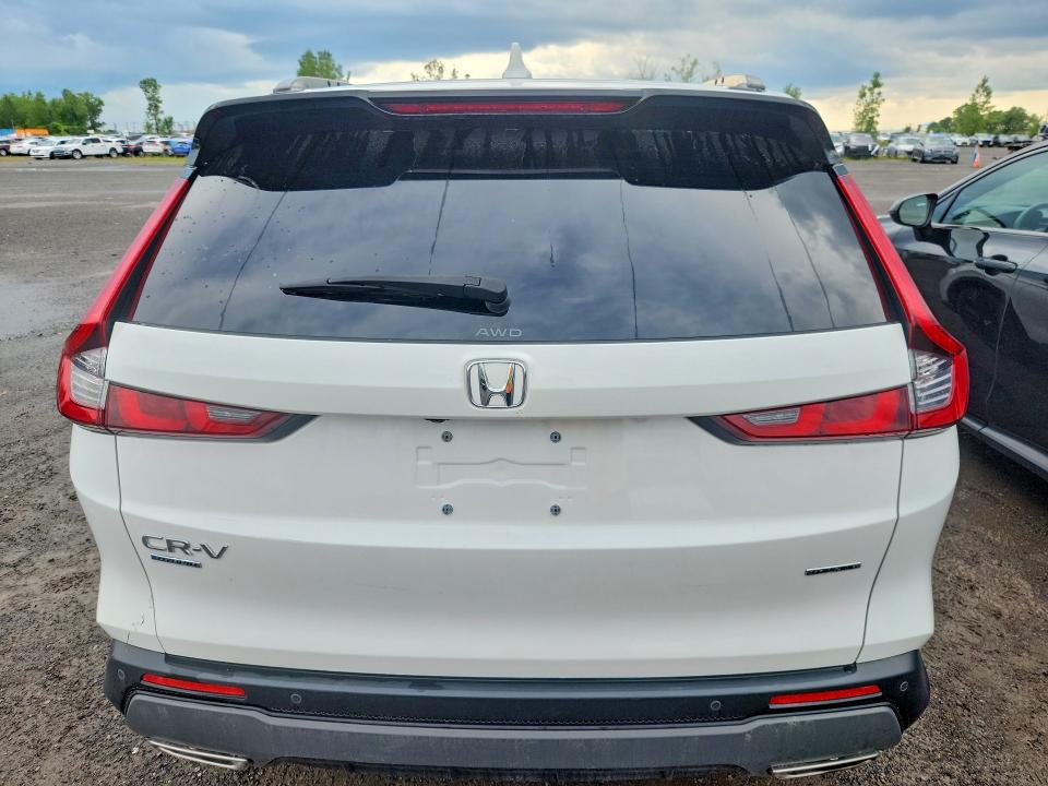 Photo 6 from auction – 2023 HONDA CR-V with VIN 2HKRS6H94PH205034
