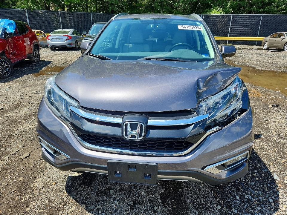 Photo 5 from auction – 2015 HONDA CR-V with VIN 2HKRM4H77FH608307