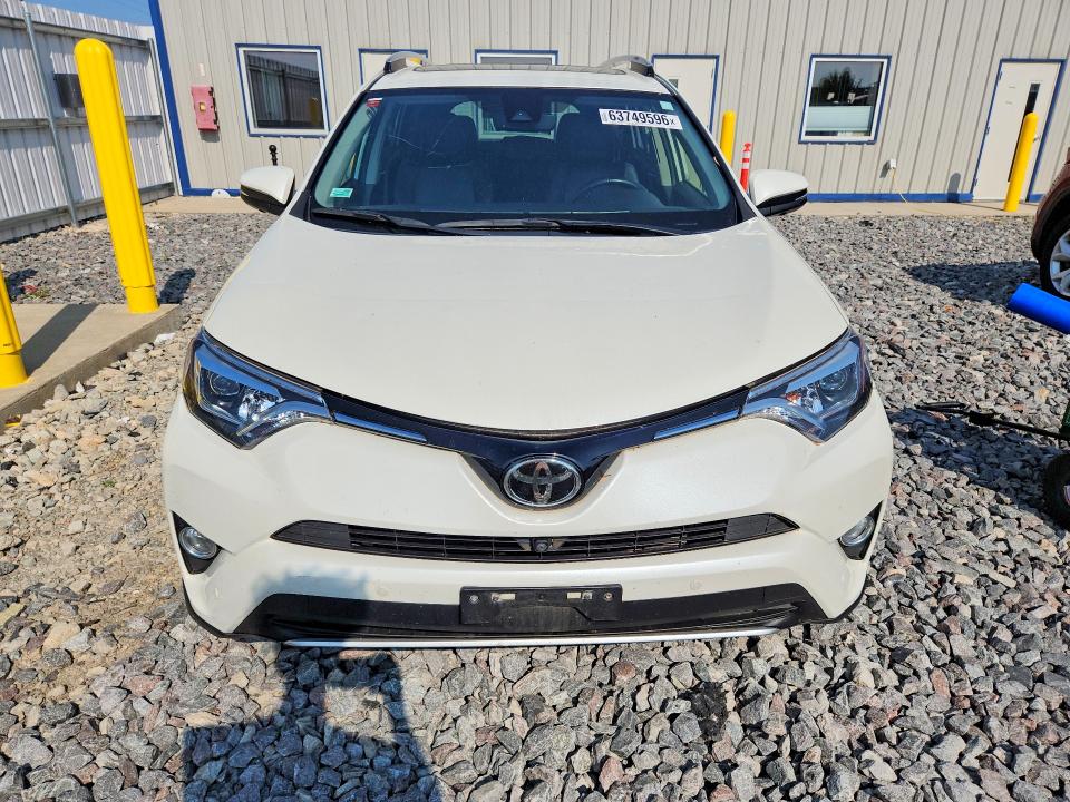 Photo 5 from auction – 2016 TOYOTA RAV4 with VIN JTMDFREV1GD176616