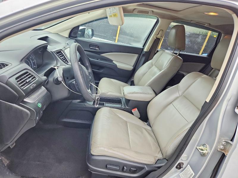 Photo 7 from auction – 2015 HONDA CR-V with VIN 2HKRM3H57FH503579