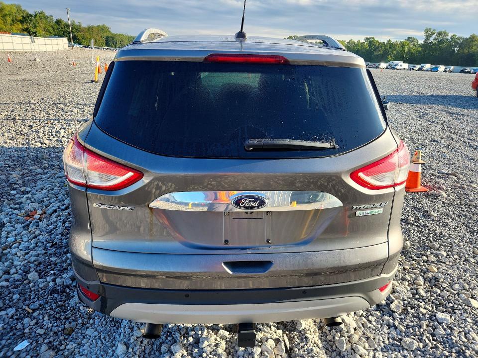Photo 6 from auction – 2014 FORD ESCAPE with VIN 1FMCU0J91EUC50440