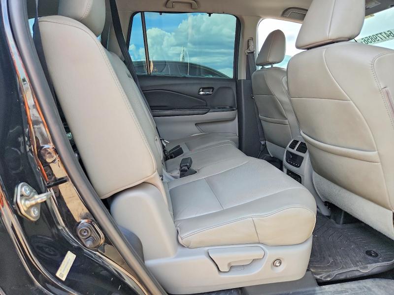 Фото 11 с аукциона – 2016 HONDA PILOT с VIN 5FNYF5H98GB027251