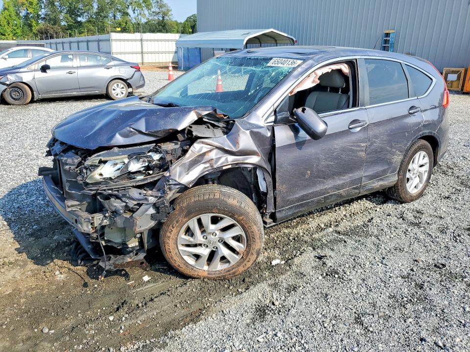 HONDA CR-V 2015 with VIN 2HKRM3H55FH545314 - Photo from auction