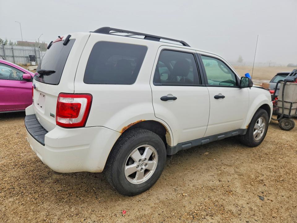 Photo 3 from auction – 2011 FORD ESCAPE with VIN 1FMCU0DGXBKA24074