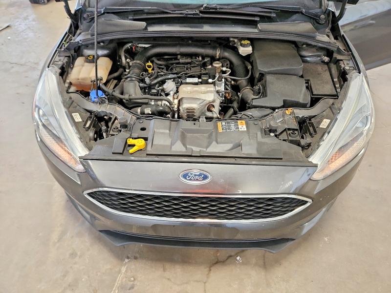 Photo 11 from auction – 2018 FORD FOCUS with VIN 1FADP3FE7JL331214