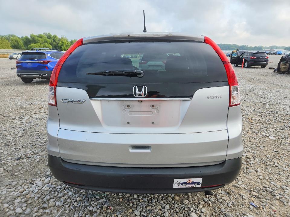 Photo 6 from auction – 2014 HONDA CR-V with VIN 2HKRM3H53EH543429