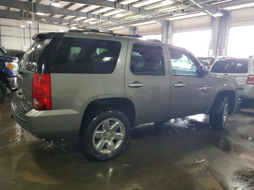 Photo 3 from auction – 2009 GMC YUKON with VIN 1GKFK33049J120896