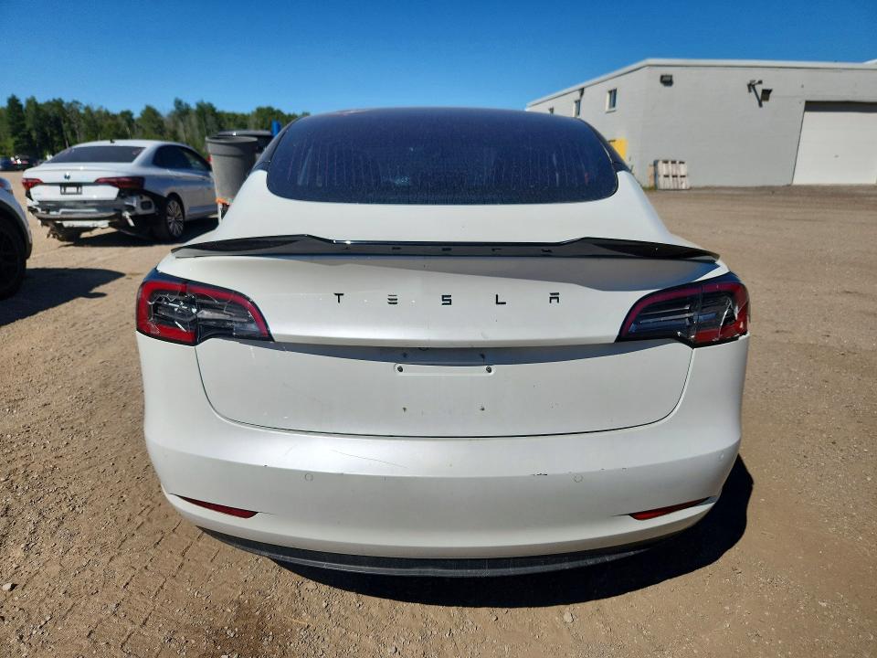 Снимка 6 от търг – 2019 TESLA MODEL 3 с VIN 5YJ3E1EA4KF309867