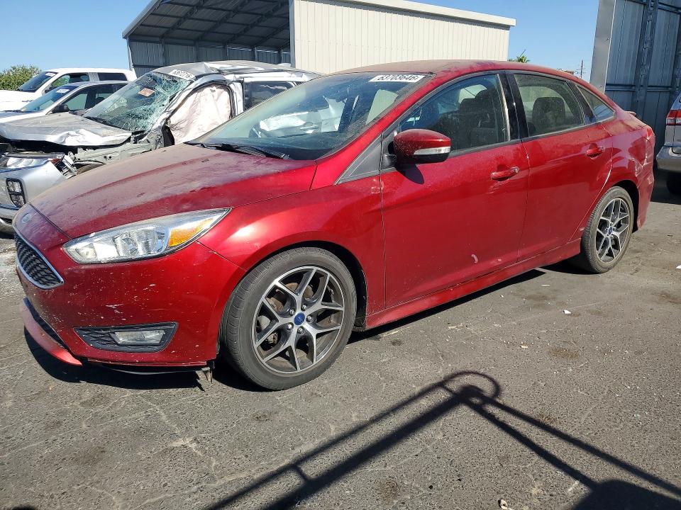 FORD FOCUS 2015 with VIN 1FADP3F26FL360216 - Photo from auction
