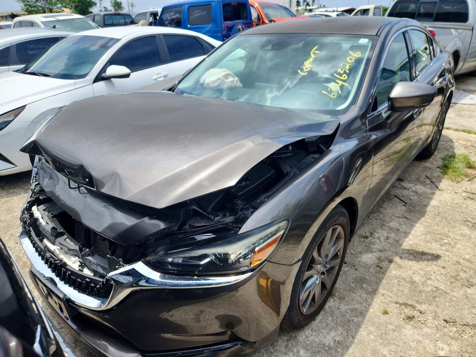 Photo 5 from auction – 2018 MAZDA 6 with VIN JM1GL1UM7J1316645