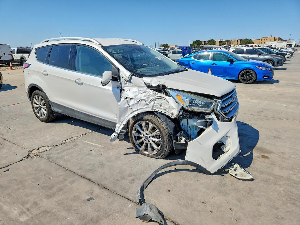 Photo 4 from auction – 2017 FORD ESCAPE with VIN 1FMCU0J94HUD21229