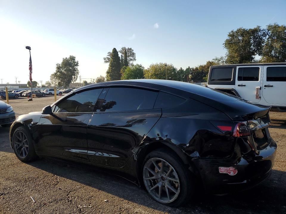 Снимка 2 от търг – 2021 TESLA MODEL 3 с VIN 5YJ3E1EA1MF002742