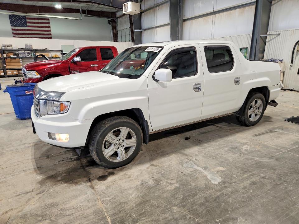 HONDA RIDGELINE 2012 with VIN 5FPYK1F52CB001699 - Photo from auction