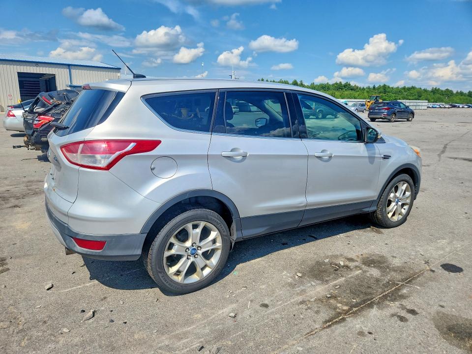 Photo 3 from auction – 2013 FORD ESCAPE with VIN 1FMCU9H97DUC95701