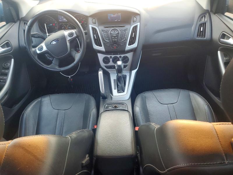Photo 8 from auction – 2014 FORD FOCUS with VIN 1FADP3F2XEL143394