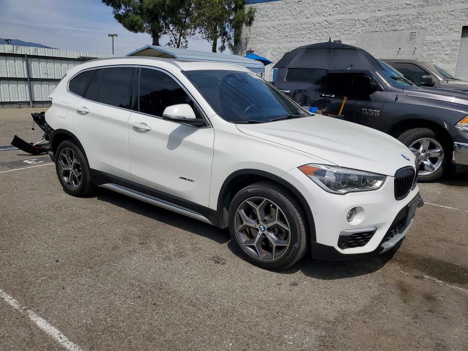 Photo 4 from auction – 2018 BMW X1 with VIN WBXHT3C38J5L26282