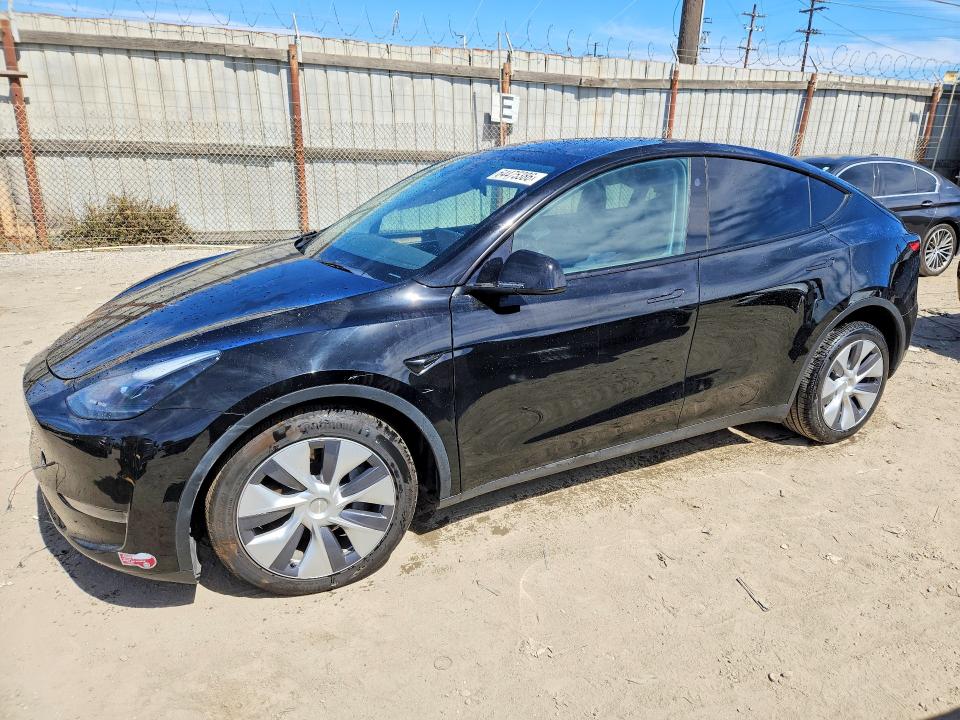 TESLA MODEL Y 2023 with VIN 7SAYGDEE9PF904051 - Photo from auction