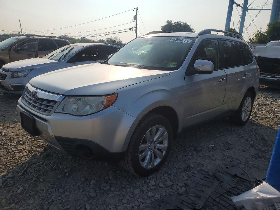 SUBARU FORESTER 2011 with VIN JF2SHADC4BH701061 - Photo from auction