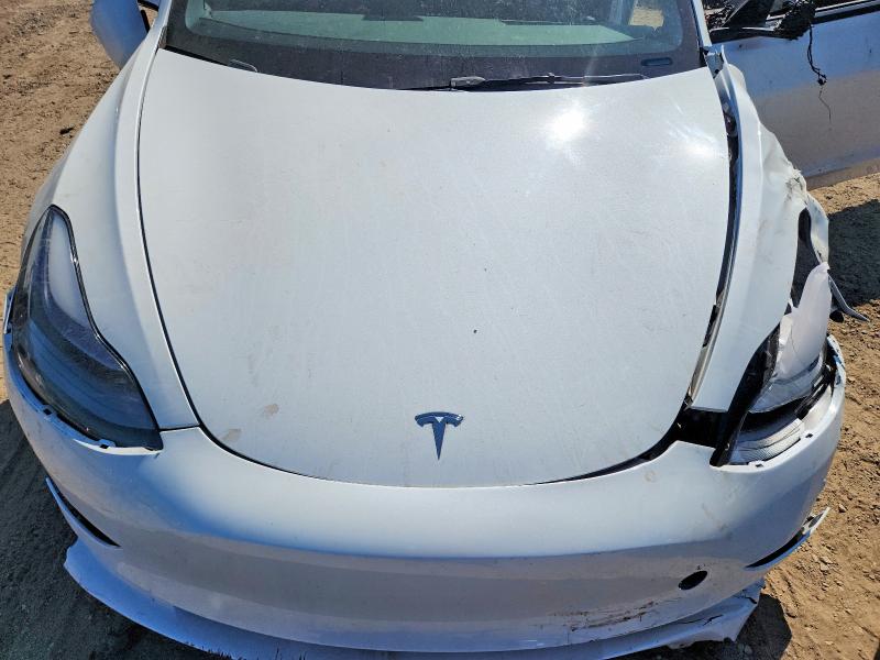 Снимка 11 от търг – 2023 TESLA MODEL 3 с VIN 5YJ3E1EB0PF611088